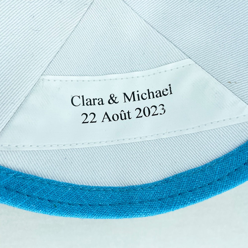 Aqua linen personalised kippah with a stitched in label on the inside